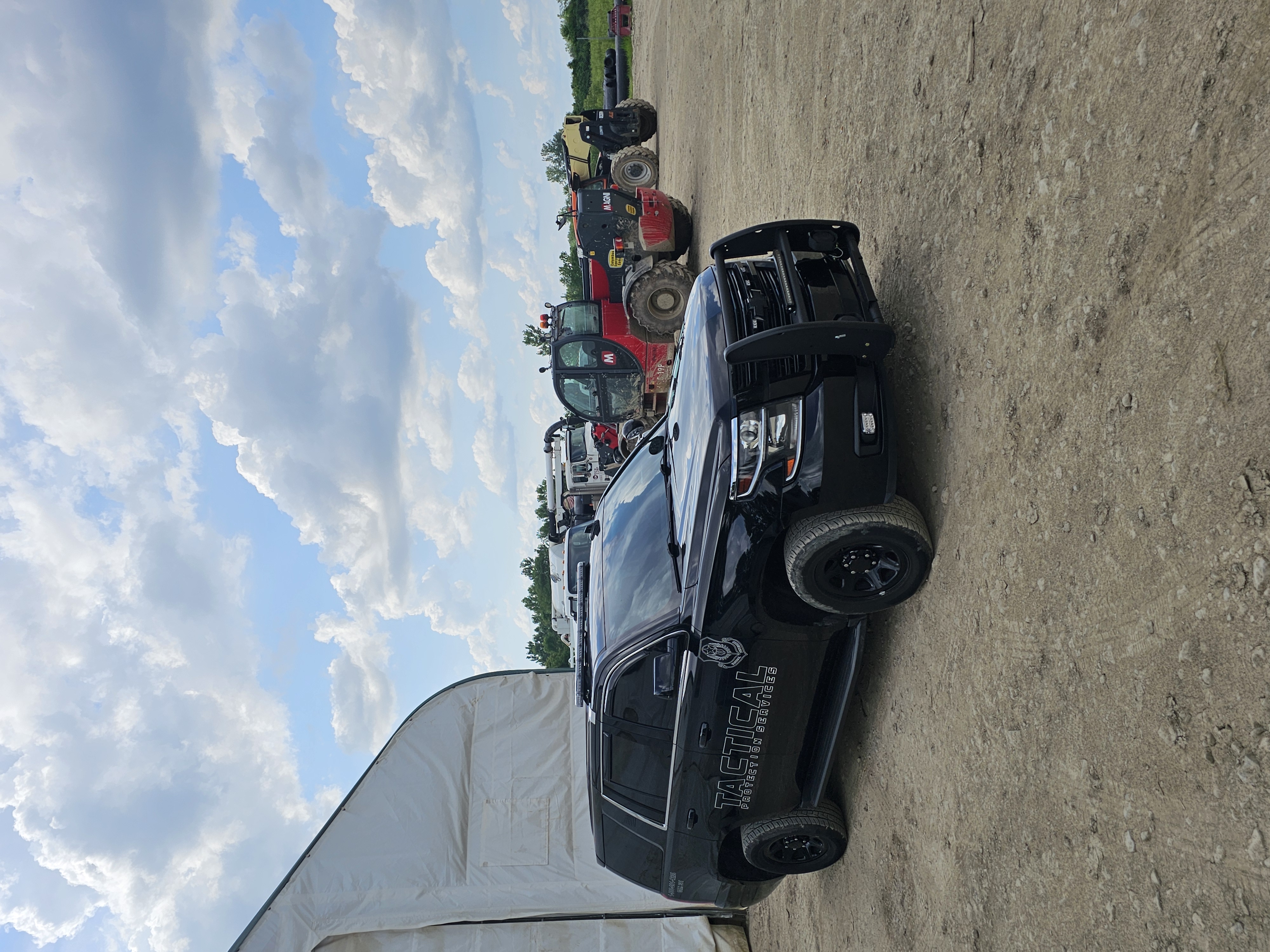 Tactical Protection Services marked patrol vehicle on construction site